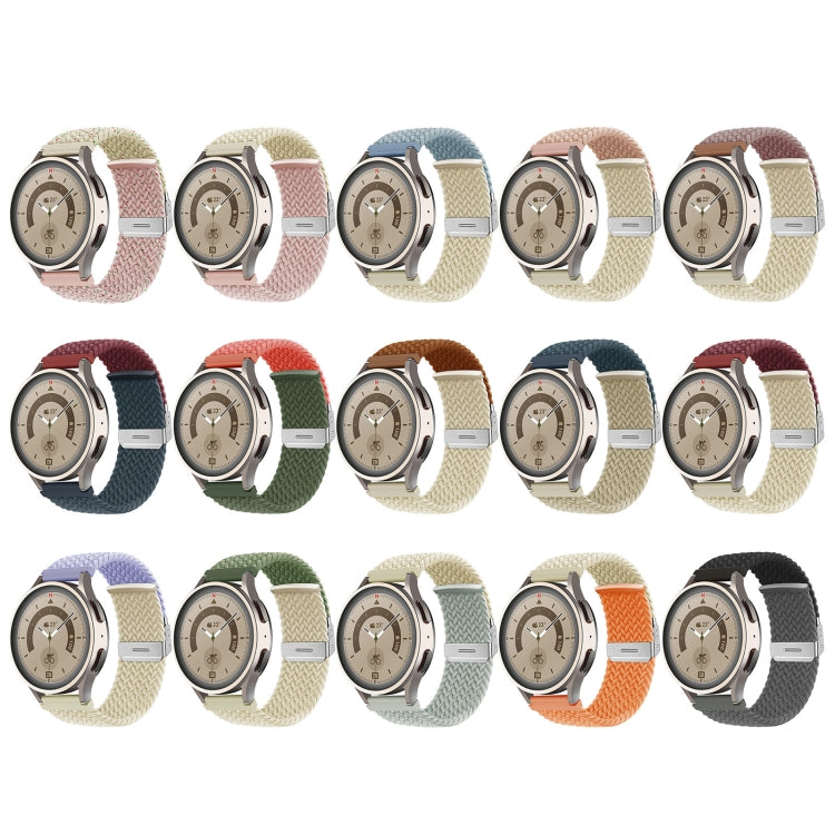 Braided nylon watch bands with buckle clasps on watches, mixed strap colors.