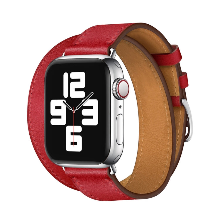 Red leather double loop watch strap with tan lining and red keeper strap