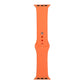 Orange silicone watch replacement strap long section with pin holes and metal buckle tabs