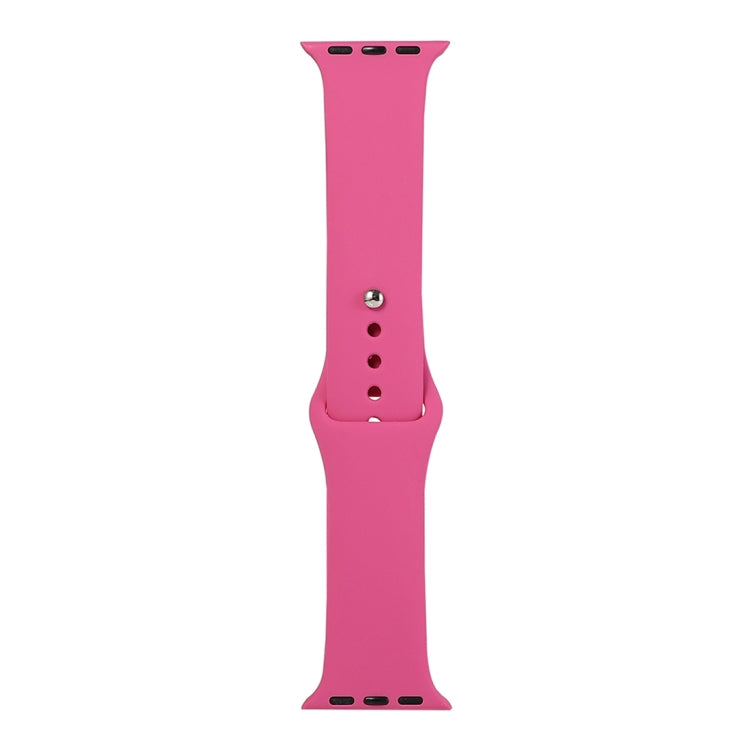 Magenta silicone watch replacement strap long section with pin holes and metal buckle tabs