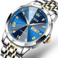 Two-tone quartz watch close-up with blue dial, gold hands, and date window reading SAT 8