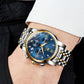 Men's multifunction quartz watch on wrist with blue dial and two-tone metal bracelet
