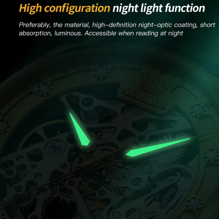 Men's hollow mechanical watch dial with luminous hands glowing green