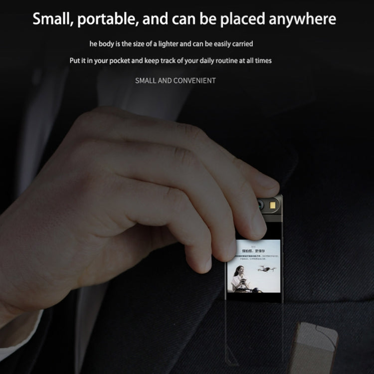 Mini HD recorder pen camera held near pocket fabric, compact dark gray design