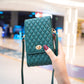 Teal quilted PU crossbody phone wallet with front flap and gold-tone clasp, held in hand