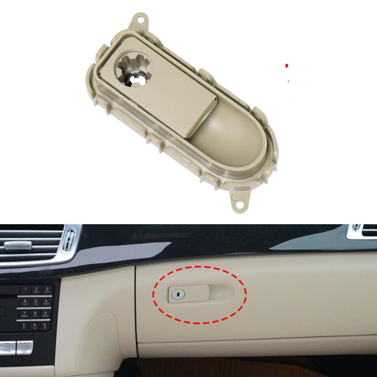 Beige glove box handle switch panel with oval button opening and mounting tabs