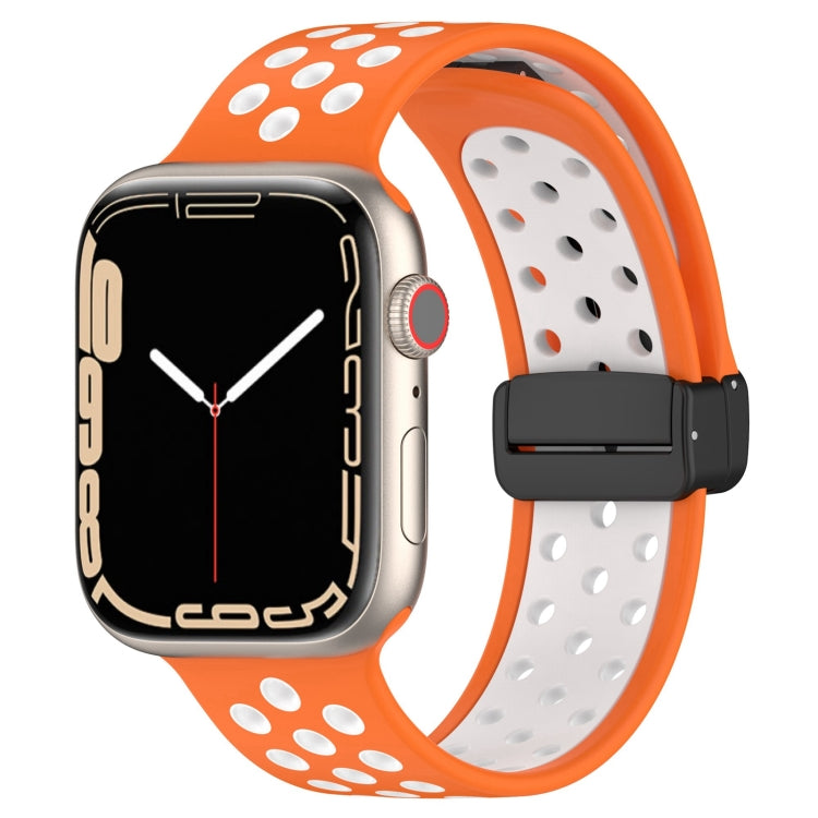 Orange silicone watch band with magnetic buckle, perforated sport-style holes.