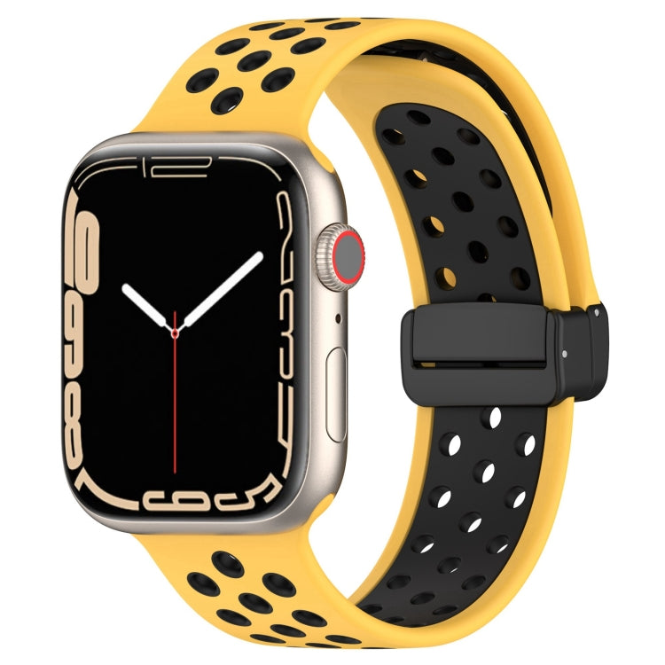 Magnetic buckle silicone watch band with yellow perforated strap and black buckle