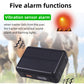 Black GPS tracker with solar panel and vibration alarm indicator