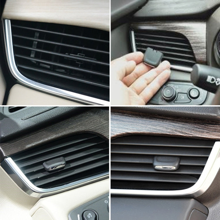 Black air outlet paddle insert installed on dashboard vent grille