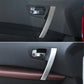Black interior door handle base bracket installed on car door