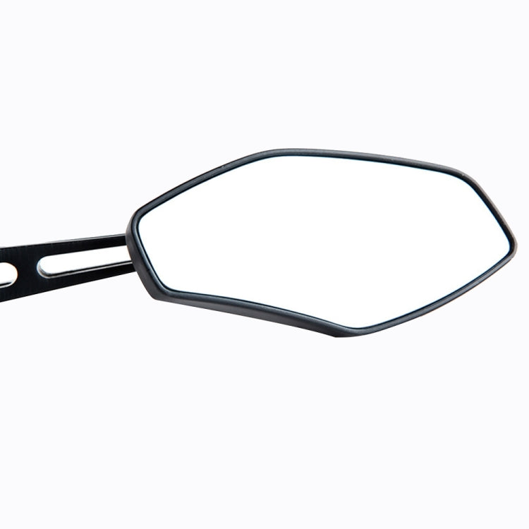 Close-up of black motorcycle rearview mirror with blue reflective glass and frame