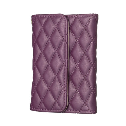 Dark purple quilted phone card holder with two vertical card slots, snap-closure flap