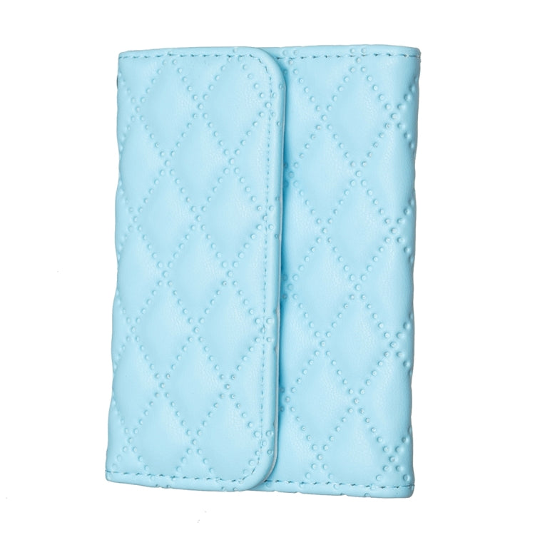Light blue quilted phone card holder with two vertical card slots and snap-closure flap