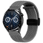 Grey woven watch band with magnetic fold clasp and black connector tab