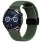 Green woven watch band with magnetic fold clasp and black connector tab