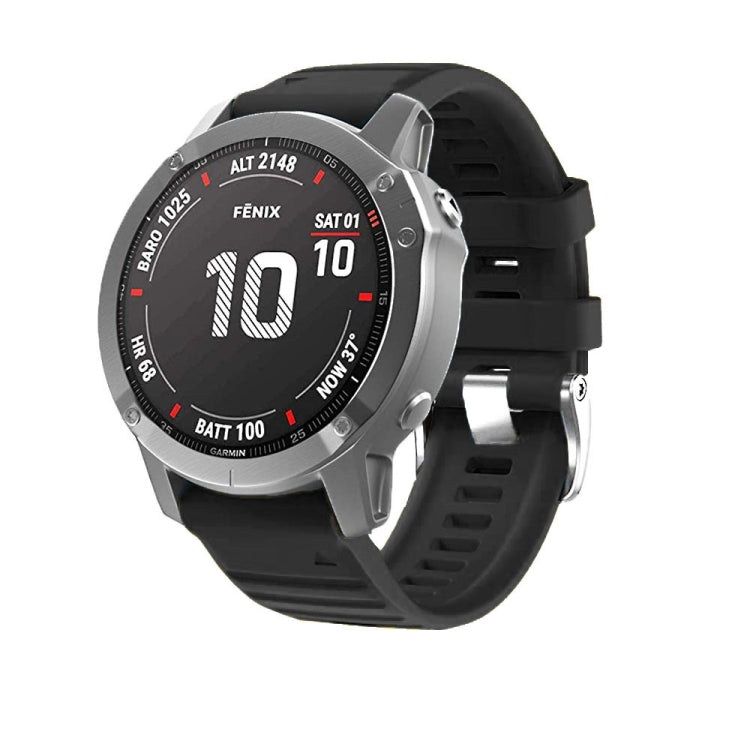 Black silicone watch band with silver steel buckle on a round smartwatch