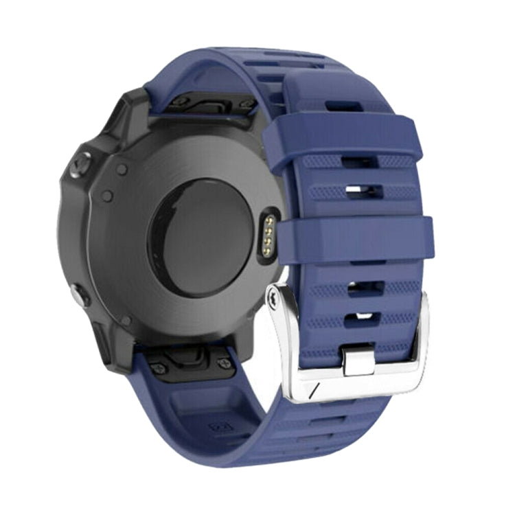 Silicone watch band with steel buckle, navy blue strap and dark watch case side