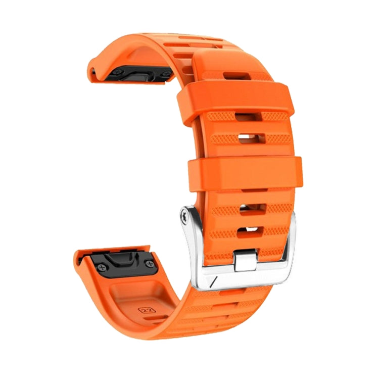 Orange silicone watch strap with silver steel buckle, adjustable perforations
