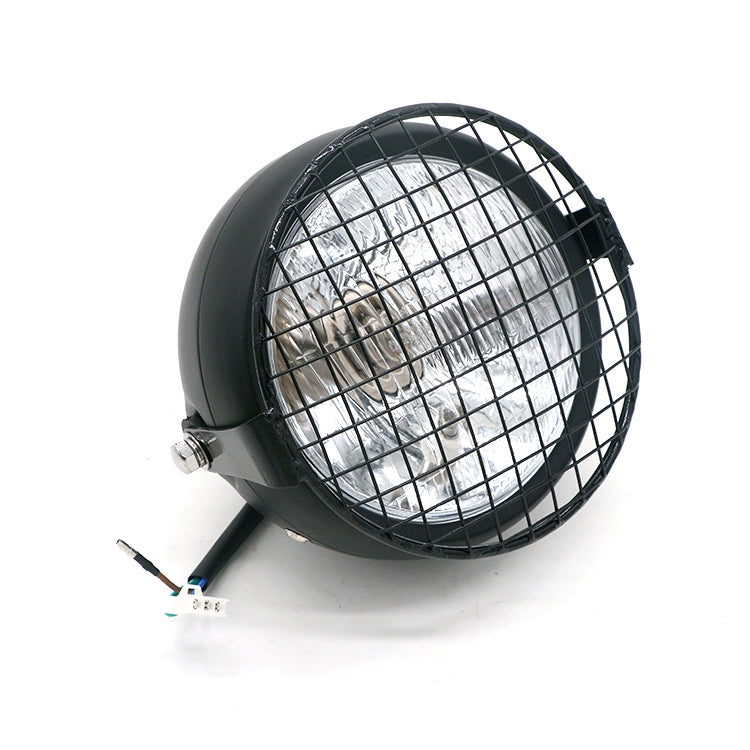 Motorcycle retro LED headlight with black wire-guard and clear reflector lens