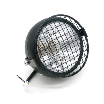 Motorcycle retro LED headlight with black wire-guard and clear reflector lens