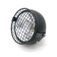 Motorcycle retro LED headlight with black housing, wire mesh guard, side mount