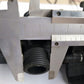 Threaded pump outlet fitting with ribbed connector, shown with caliper measurement