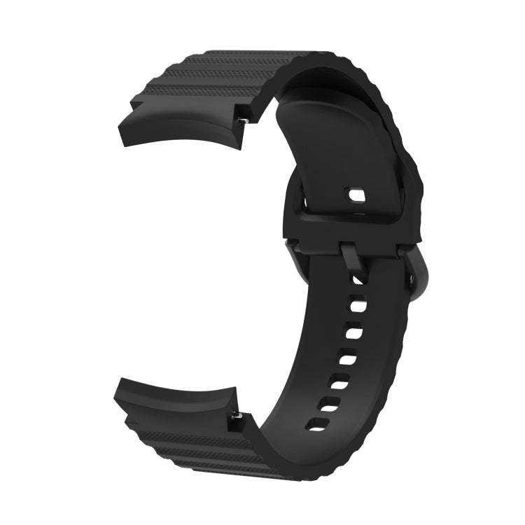 Black silicone watch band with wave dotted texture and buckle, side view