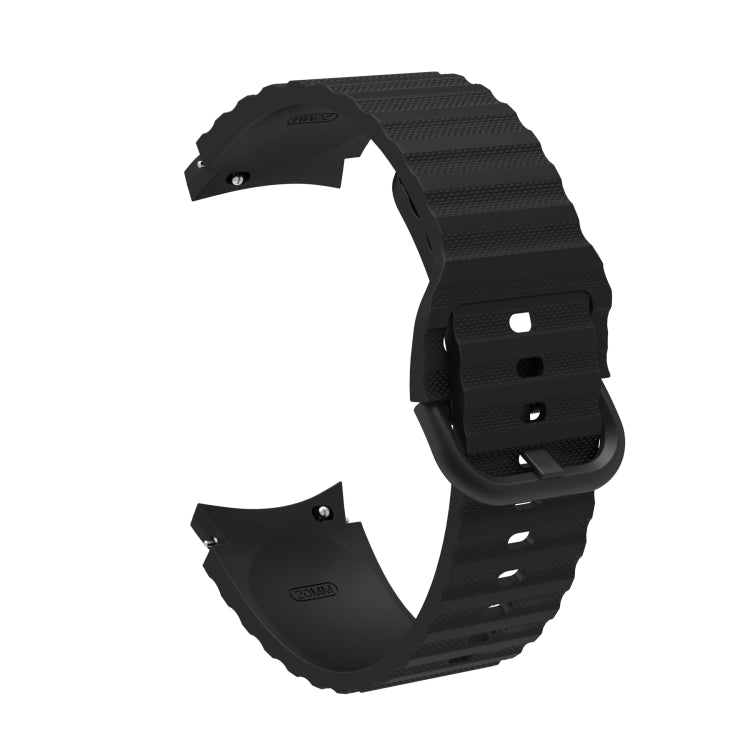 Black silicone watch band with wave dotted texture and buckle, clasp parts shown