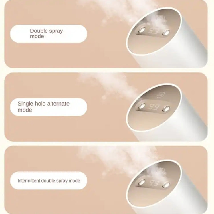 White double-jet humidifier showing circular top and jet outlet, emits visible mist.