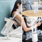 White humidifier emitting mist from top nozzle on a stand for home use.