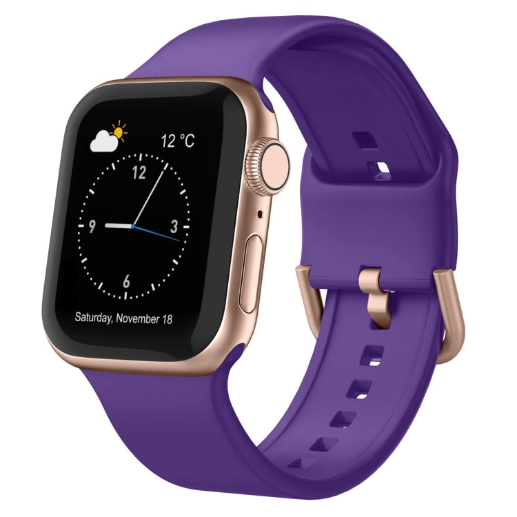 Purple silicone watch band with pin buckle and row of strap adjustment holes