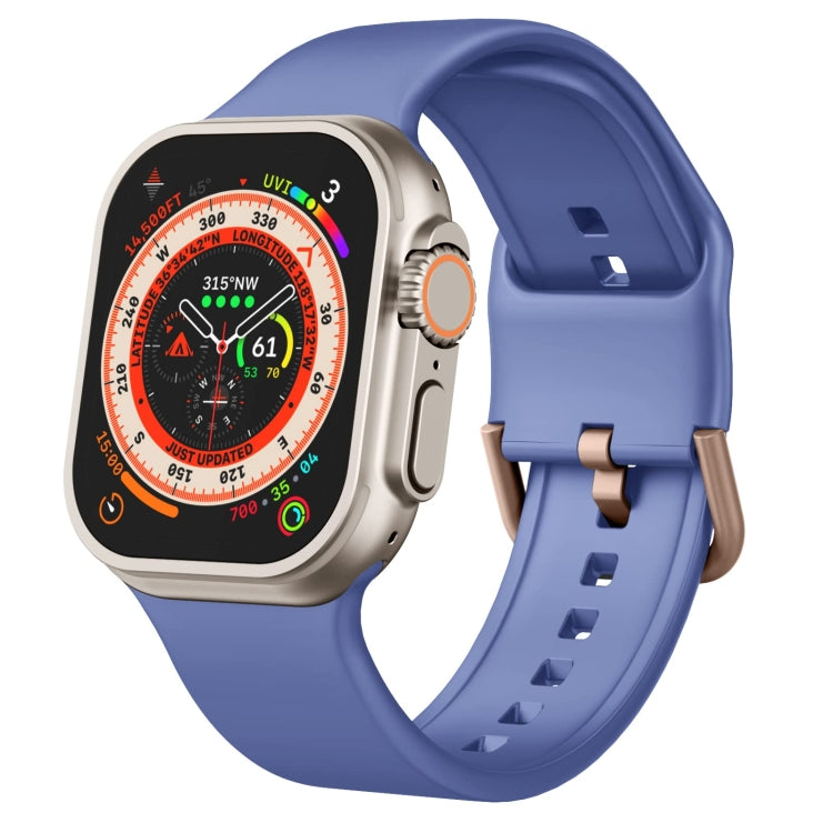 Purple silicone Apple Watch pin buckle band with perforated strap and secure clasp.
