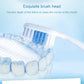 Soft toothbrush head with dense white bristles for corner mouth cleaning.