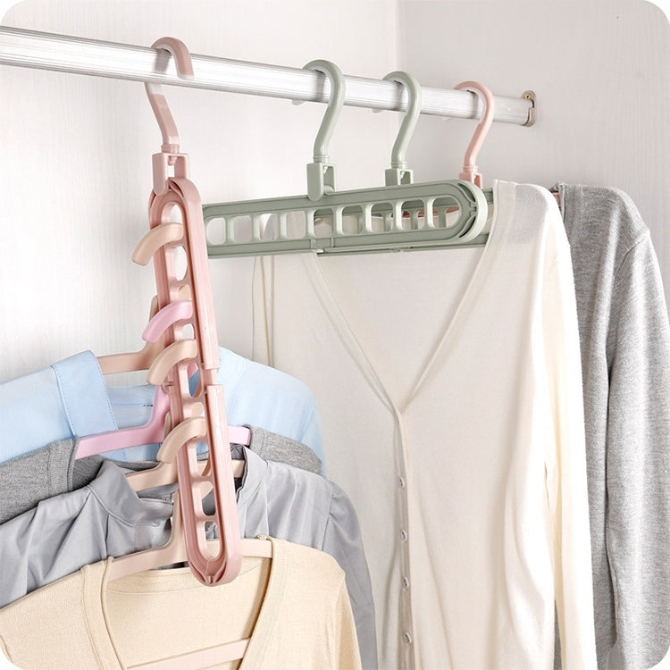 Multifunctional nine-hole clothes hanger with rotating frame, pink and mint clips