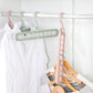 Nine-hole clothes hangers on a rod, pink and mint green with multiple hooks