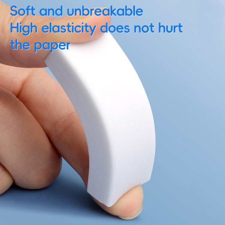 White 2B eraser block held in hand for drawing mark removal