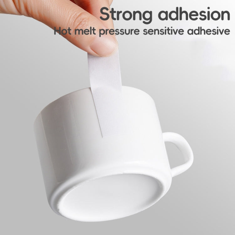 Hand lifting a strip from a double-sided adhesive tape roll
