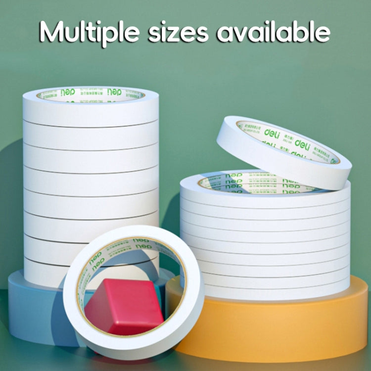 Multiple double-sided adhesive tape rolls on white spools with green label