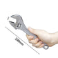 Chrome adjustable wrench in hand, 200mm length marking visible on handle