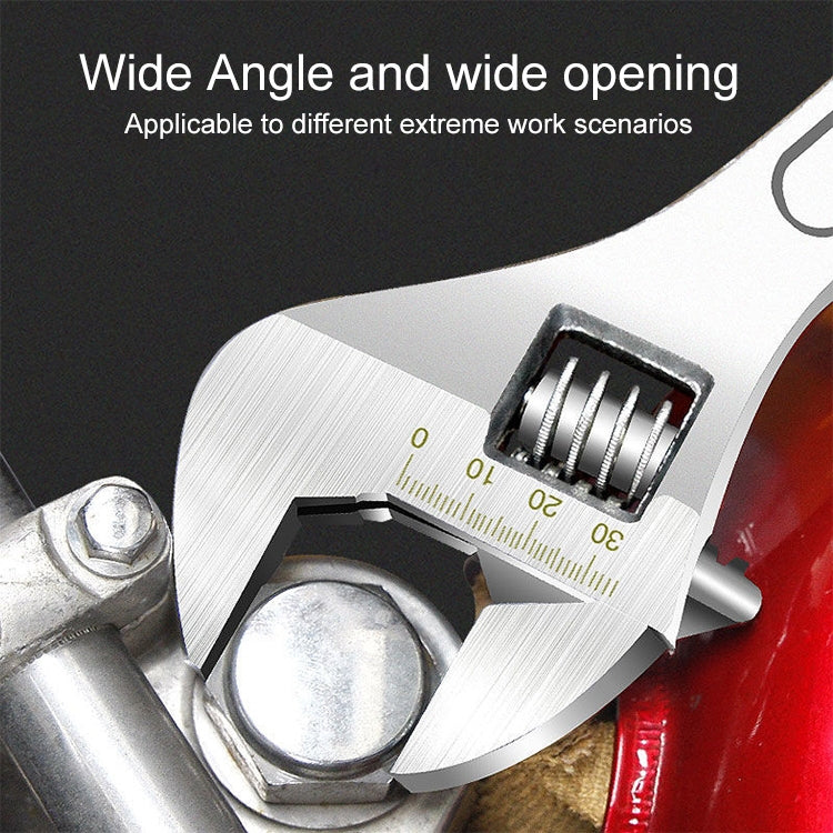 Chrome adjustable wrench with wide opening and ruler-style scale near jaw
