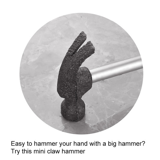 Mini claw hammer metal claw head close-up
