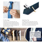 Gold and silver tie clips with spring clamps on a dress tie