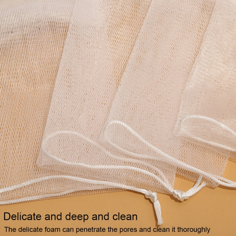 Cream-colored mesh foaming net with white drawstring along the edge