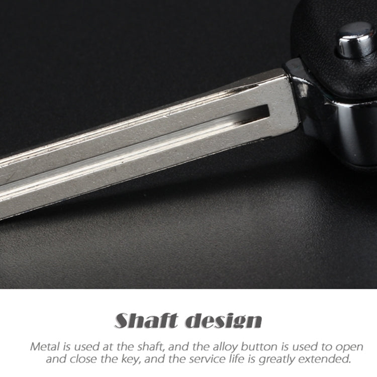 Black folding key shell with chrome key blade extended