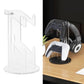 Desktop display stand with clear holder, supports black and white controllers and headset
