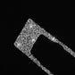 Silver diamond glitter sticker insert for car air conditioning control panel, angled close-up
