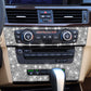 Silver sparkle air conditioning control panel sticker on dashboard around climate knobs and buttons