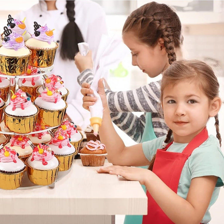 Three-tier cupcake stand with cupcakes on clear round shelves