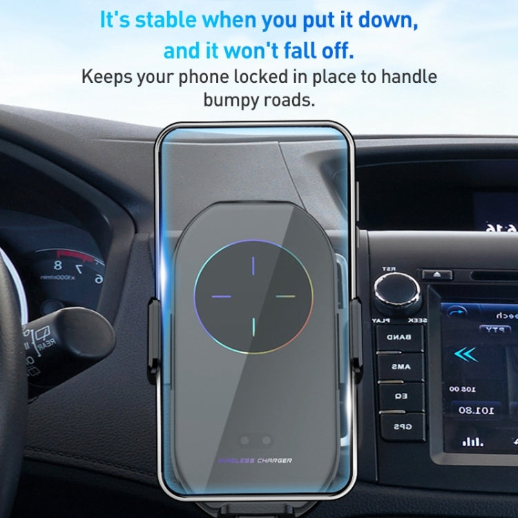 Wireless phone holder mounted in car dash with illuminated charging ring